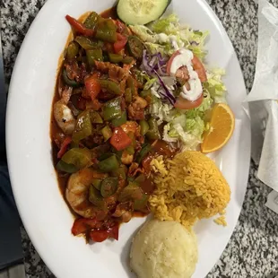 Shrimp a la diabla, mashed potatoes, rice and salad