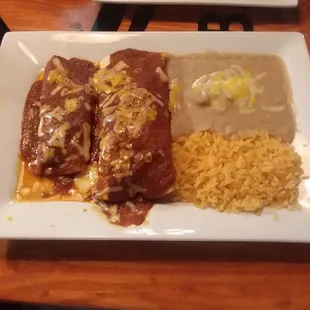 Two Item Combo Platter - Enchilada And Burrito, Rice And Baby Poo With Cheese.