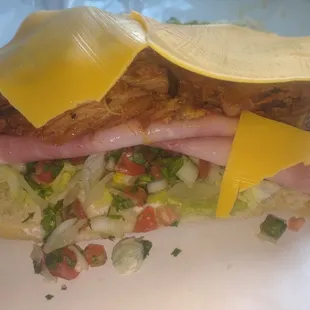 Cuban Sandwich
With Pork, Ham, cheese, pico de Gallo and pickles 
$7.99
