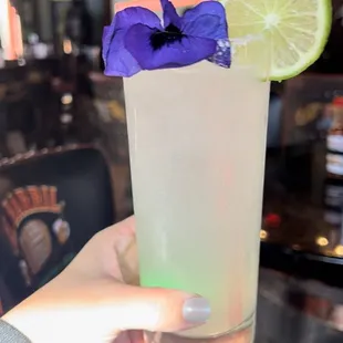 a person holding a drink