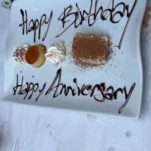 a happy birthday cake on a plate