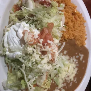 Steak burrito with refried beans &amp; Spanish rice
