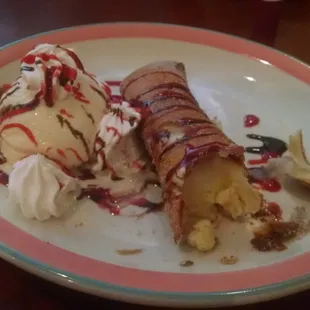 A fried dessert filled with cheesecake, apparently a recent addition to the menu.