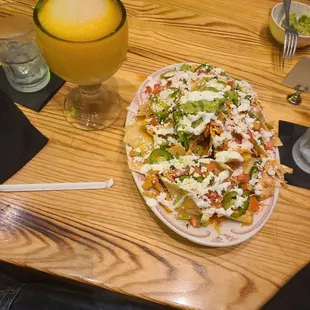 Passion fruit margarita and nachos