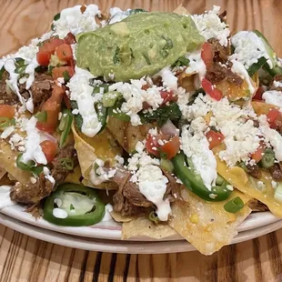 Carnitas Nachos (sub for chicken tinga). GET THIS.