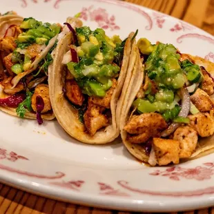 three tacos on a plate