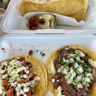 Hot dog, tacos al pastor, and taco de cabeza. Toppings and bacon-wrapped habañero on the side.
