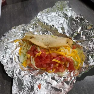 a taco wrapped in foil