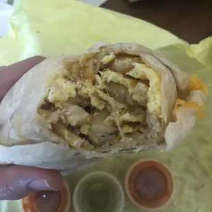 Eggs cheese potatoes beans and bacon. $6.75