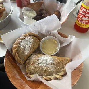 Beef empanadas, plantains, and Kola Ingles to wash it down