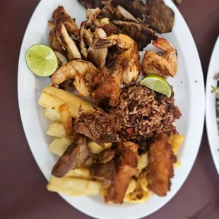 Botanas Plate (Plato De botanas) - Casamiento (Salvadoran Beans and Rice), fried wings, beef, chicken thighs, plantains, french fries, and s