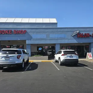 There is no sign out yet. It is tucked between the smoke shop and salon