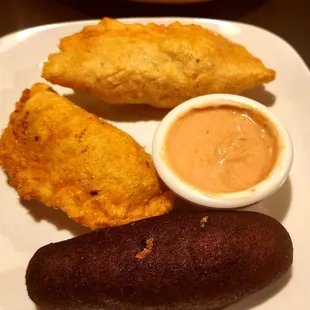 Pastelillos and an alcapurria. Meh