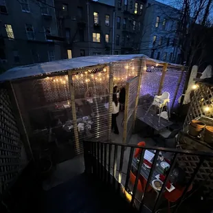 a view of a patio at night