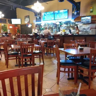 Restaurant inside seating and view of the bar area