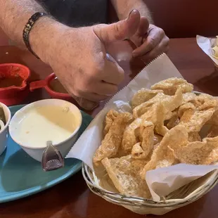 Hot queso and chicharrones.