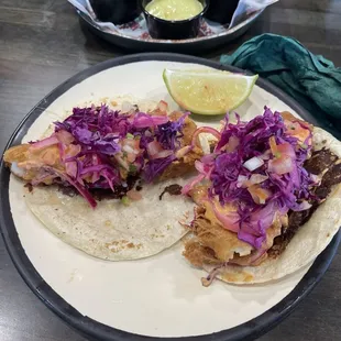 Fish tacos on corn.  Menu has then on flour but the corn tortilla was a solid choice.