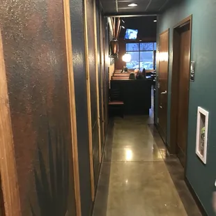 a hallway leading to a restaurant