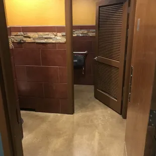 a bathroom with a toilet and a sink