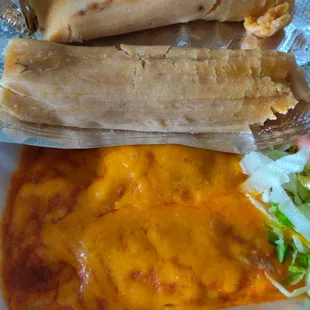 Pork tamal and chicken enchiladas. Not too bad. Very fulfilling.