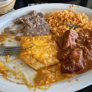 Texas Plate- 2 enchiladas, carne guisada, rice and beans.