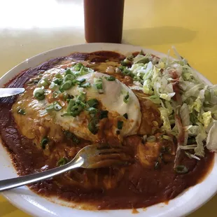 Stacked cheese enchiladas w/ an egg