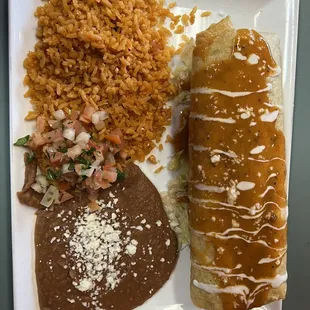 Chicken Chimichanga plate with rice and beans. Yea...you want this.