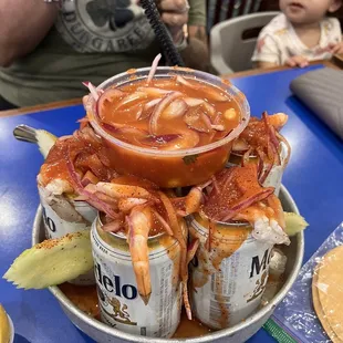 Modelo topped with shrimp fish octopus some veggies pretty good.