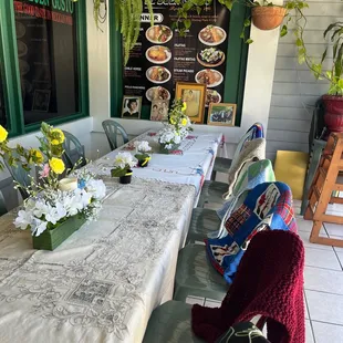 a long table with flowers on it
