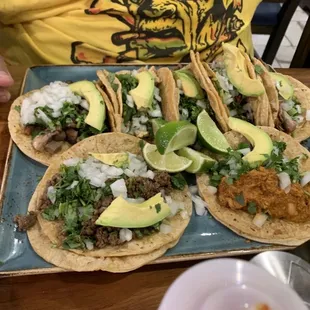 One of each taco on the menu