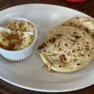 Pupusa with beans, cheese and chicharrón