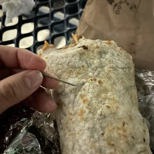 Piece of metal found in burrito