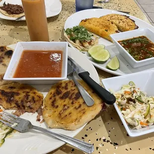 Pupusas and a variety of tacos.