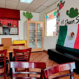 a mexican restaurant with tables and chairs