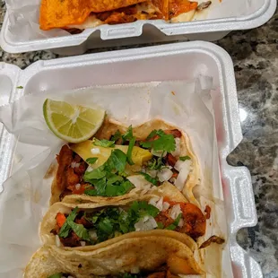 Pastor quesadilla (top) and pastor tacos (bottom)