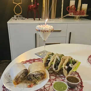 Al Pastor Buritto and Tacos De Asada with the brown and green salsa