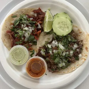 1 carnitas and 1 al pastor taco