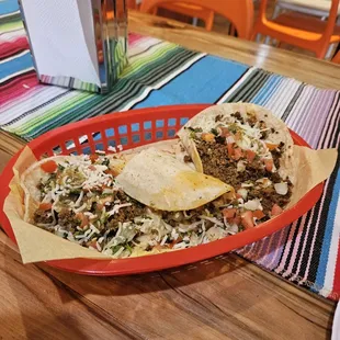 Flys landed on this plate. Dry  zero salt on beef, ugh. Chile Rello was good,and the potato tacquitos saved this meal.