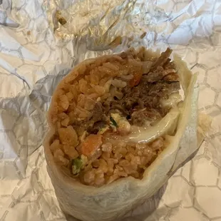Machaca burrito $11.75 on 9/30/23. That didn&apos;t use to have rice in their burritos but it&apos;s standard now.