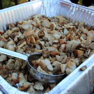 Hand cut, seasoned, and grilled pollo asado.