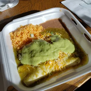 Enchiladas, beans, rice, and guacamole