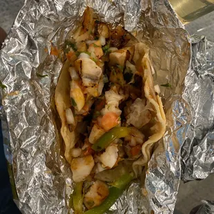 Fish Taco - fish spilling out of the shell