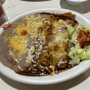 Cheese enchilada with diced onions