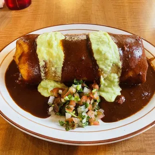Heavenly &quot;wet&quot; red sauce graced my memorable vegetable burrito.