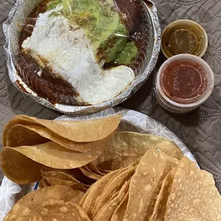 Super burrito and a pile of crispy chips!
