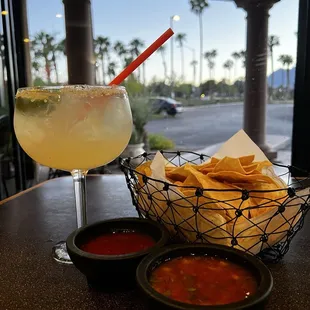 Large margarita chips and salsa and that sunset
