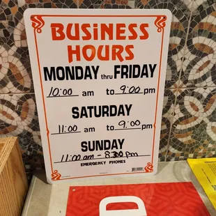 a business hours sign