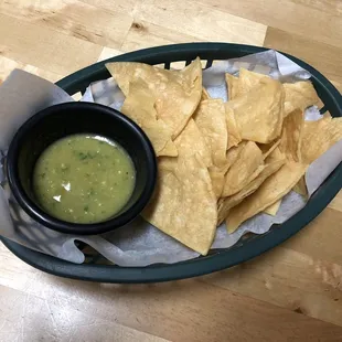 Complimentary chips and salsa verde