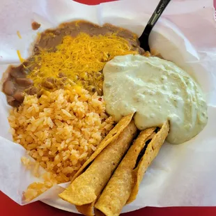 Taquitos (shedded beef) Value Meal with something they call guacamole.