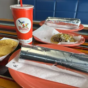 Breakfast burrito and regular burrito and 1 taco and medium drink. Burritos are huge!